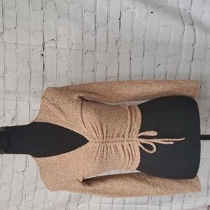 Tan colored V-neck sweater, size Small